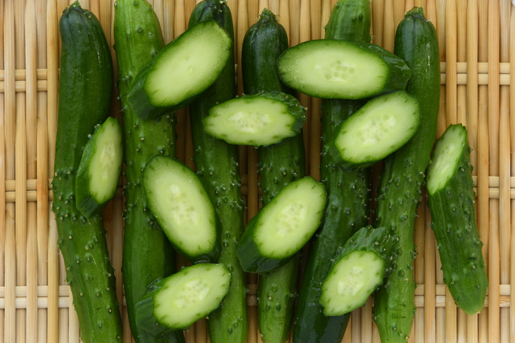 Fresh cucumber on bamboo strainer.