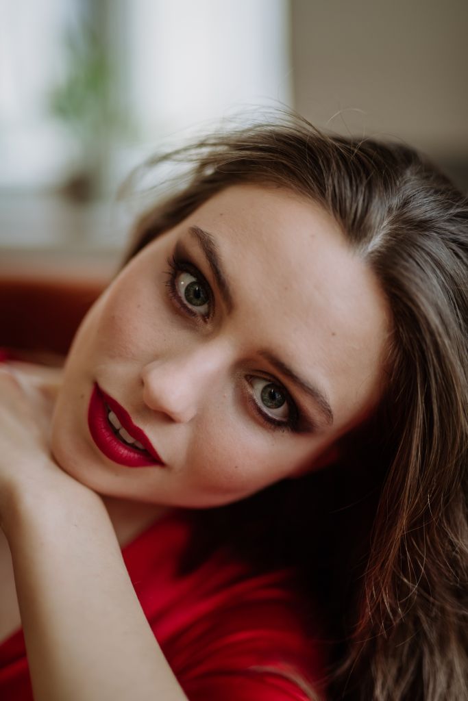 Portrait of young woman with evening make-up.