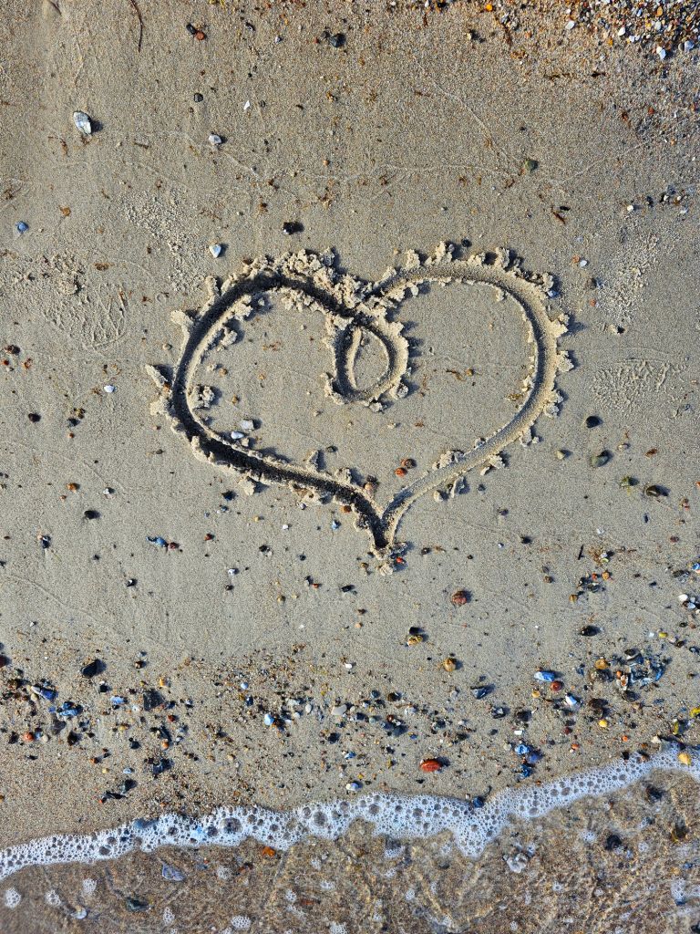 heart drawing in the sand