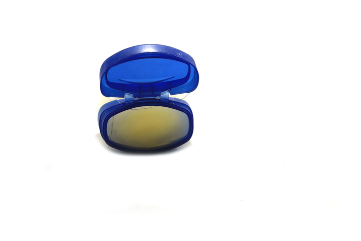 Vaseline or petroleum jelly can be used for lips in winter and other seasons to keep lips moisturized and not chapped on a white background.