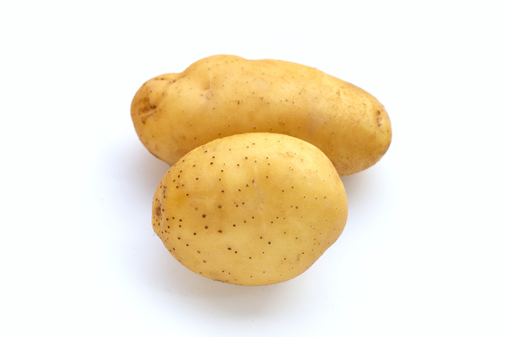 Fresh patatoes on white background.