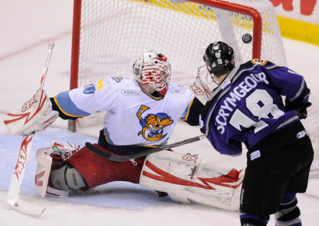Reading's John Scrymgeour (18) scores over the glove side of Toledo goalie Thomas McCollum (30).Reading Royals lose 7-3 to the Toledo Walleye in an ECHL minor league hockey game at the Sovereign Center, Reading.Photo by Jeremy Drey3/13/2011