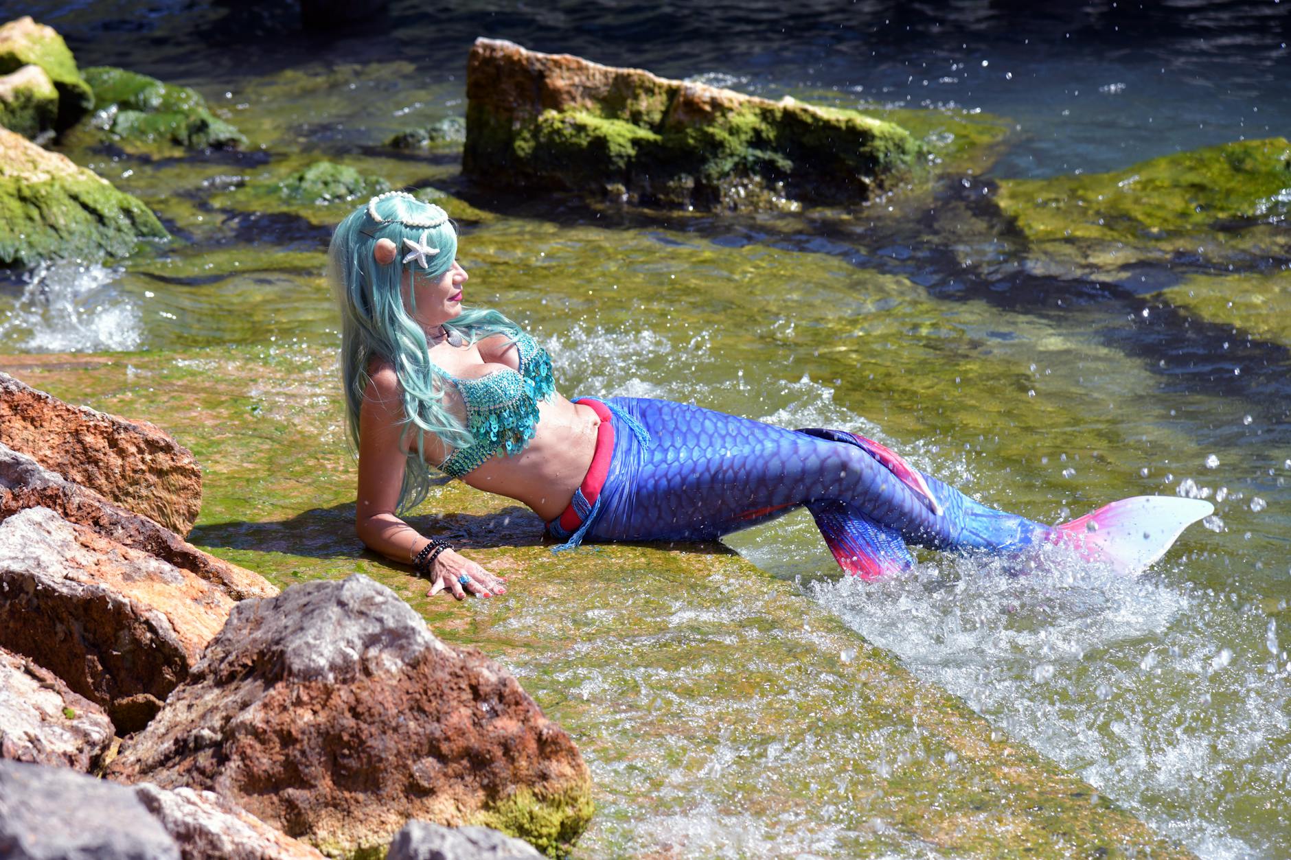 woman wearing a mermaid costume