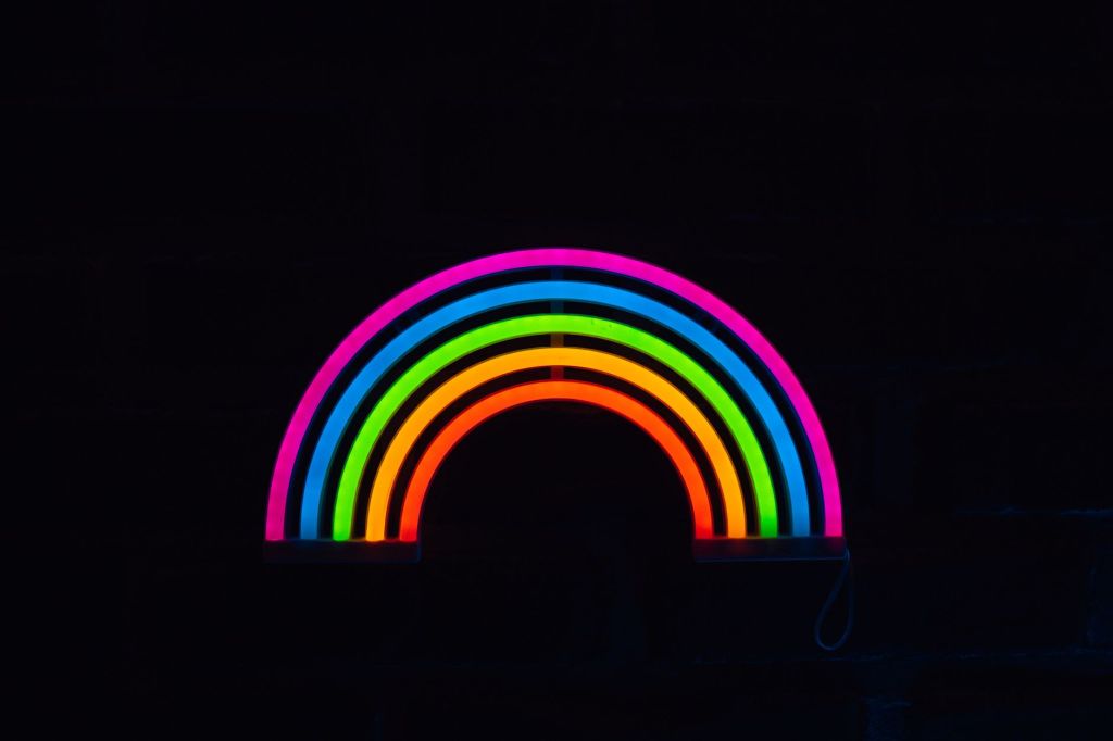 a rainbow colors on a dark background