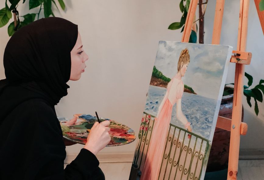 woman while painting